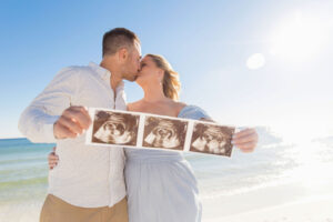 30A family photographer taking photos on the beach